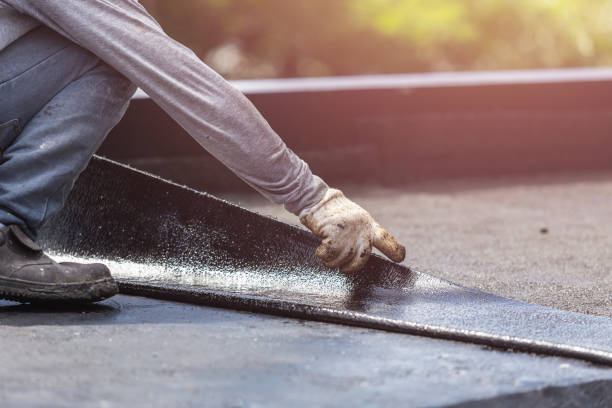 Professional Waterproofing technician working in Adell, WI